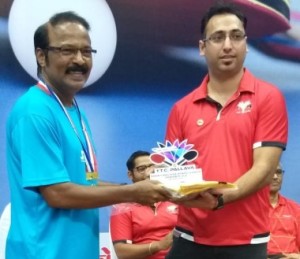 Anil Rasam ( Left) winner in Men's 60+ receiving his trophy 