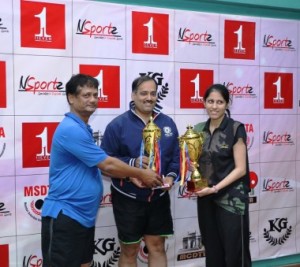 Apeksha Bhagwat (right) and Vishal Yadav of Tata Consultancy Services winners of the mixed doubles event