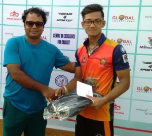 :  Mr Jwala Singh , director of the Mitsui Shoji T20 League greets Mumbai Ranji batsmen Jay Bista, whose consistency brought him his second man of the match award. 