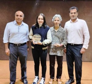 (left-right) CCI President, Premal Udani with Taarini Suri, Hufrish Nariman and CCI Vice-Chairman Ranjeet Vaswani at the felicitation function of young shuttler Taarini.