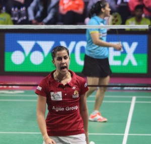 Carolina Marin cheers for herself during her match against Saina Nehwal at PBL-2 