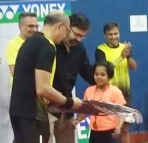 Unseeded Arya Mestry who emerged champion in the Girls U-11 at the Greater Mumbai Badminton Association ‘50th Golden Jubilee’ badminton tournament , receives her award from Ayaz Bilawala and Mangirish Palekar.  