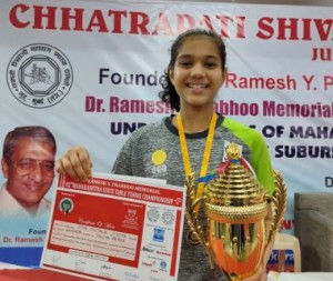 Diya Chitale is all smiles, as she poses with the Trophy she won in the Youth Girls Singles 