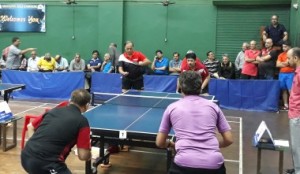 Exciting doubles match in progress, with Dinkar & Yogesh facing camera and Vivek A and Vivek B with their backs towards camera.