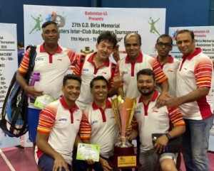 The victorious Goregaon Sports Club team proudly pose with the Plate Division Team Championship Trophy of the 27th G.D. Birla Memorial Masters Inter-Club Badminton Tournament.