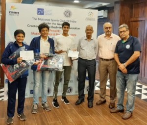 From left to Right - Champions Goregaon Sports Club pose with Sundar Shetty, Hon. Secretary, Maharashtra Badminton Association, Pradeep Iyengar, President, Greater Mumbai Badminton Association, Ravi Punjabi, Convenor Badminton, NSCI at the Prize Distribution of the Kanji Cup finals played at the New Badminton Courts, NSCI on Sunday.