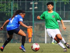 Kenkre FC attacker Yumlembam Thailand Devi (right) tries to get past Amma FC defender Savita Chavan 