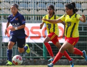 Kenkre FC striker Nabam Kamyi (left) and Next SA defender Gauri Singh challenge for the ball during their WIFA Women's Football League match .