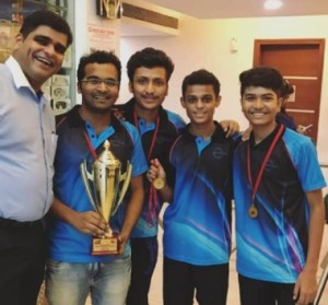 MLWB(NMJ) boys are all smiles while posing with the Winner's trophy won by them in MCDTTA 3rd Division TT League. 