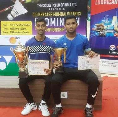 Champion Viraj Kuvale (left) and runner-up and elder brother Viplav Kuwale, pose with their respective trophies.