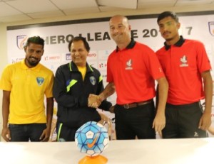 Mumbai FC Head Coach Santosh Kashyap (2nd left) shakes hands with DSK Shivajians Manager Dave Rogers on the eve of the I-League encounter at the Cooperage ground on Sunday. Mumbai FC captain Steven Dias (left) and Shivajians skipper Sumeet Passi look on.