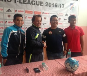 Mumbai FC Head Coach Santosh Kashyap (2nd left) shakes hands with Shillong Lajong Manager Thangboi Singto at the pre-match briefing ahead of the 5th round –I-League match 