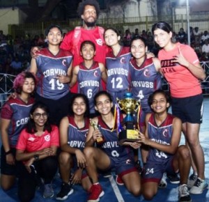 Corvuss Basketball Academy players are all smiles as they pose with the winners’ trophy and prizes along with their head coach Ollie Bailey.