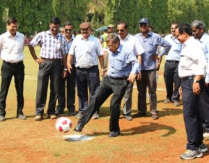 Mr. C.M.T. Britto, Director, Technical, RCF kicks the ball to inaugurate the 110th RCF-Nadkarni Cup football tournament 2016-2017