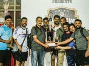 The victorious Our Lady of Health Parish veterans’ team proudly pose with the ‘Orlem Super Cup’, along with Guest of Honour Steven Dias, a former India striker.