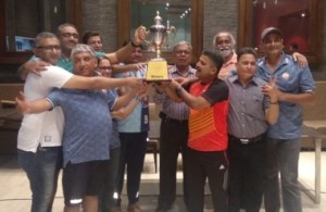 PJ Hindu Gymkhana Players receiving the Trophy from their President Raju Koradia