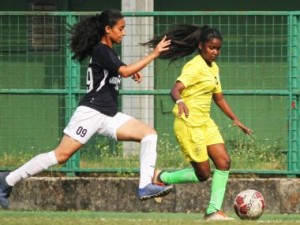 Footie First attacker Annu Gupta (right) runs past Krida Prabodhini midfielder Sanika Despande during their WIFA Women’s Football League 