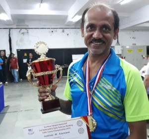 Prasad naik poses with his trophy won during the 3rd State ranking Veterans TT Tournament in Men's 50+ at  Prabodhankar Thackeray Kreeda Sankul, Vile Parle, Mumbai.  