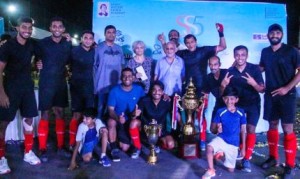 The victorious Mumbai Customs players pose with the ‘Champions’ trophy along with Chief Guest Olympian Margaret Toscano, former India Hockey player and Dronacharya Award recipient Marzban Patel (Bawa) at the prize distribution function of the  ‘Savio Super 5s’ hockey tournament 