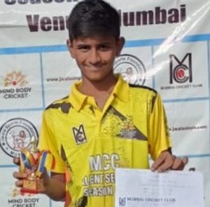 Sourish Deshpande with the man-of-the-match trophy 