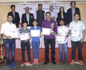 KhelSeva Awardee Ulhas Shirke( centre) with recipients of Young Sportspersons award Om Kubal, Eshita Revale,Jyoti Dafale, Ojas Jadhav, & Mandar Hardikar along with Shirish(Aju) Deshpande,Rtn. Nitin Vichare,Rtn.Prafull Sharma( Chief Guest),Yajuvendra Singh ( Former test Cricketer), Chhaya Pawar & Prof. Rajesh Deo( Standing behind) .  