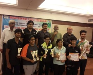 Winners and runners-up of Men's, Women's, Junior Boys and Girls pose with their trophies. 