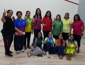 Women medal winners pose together 