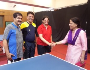 Suhas, Jayant and Neeta Kulkarni greeted by former National level TT player Ratan Mahajan( Ext Right)